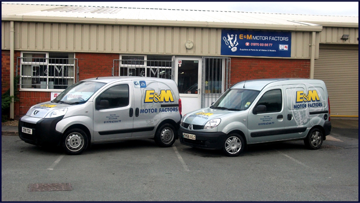 E and M Delivery Vans outside the Aberystwyth Shop